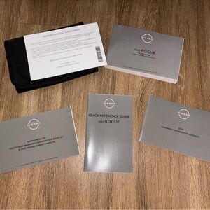 2023 Nissan Rogue owners manuals guides box v